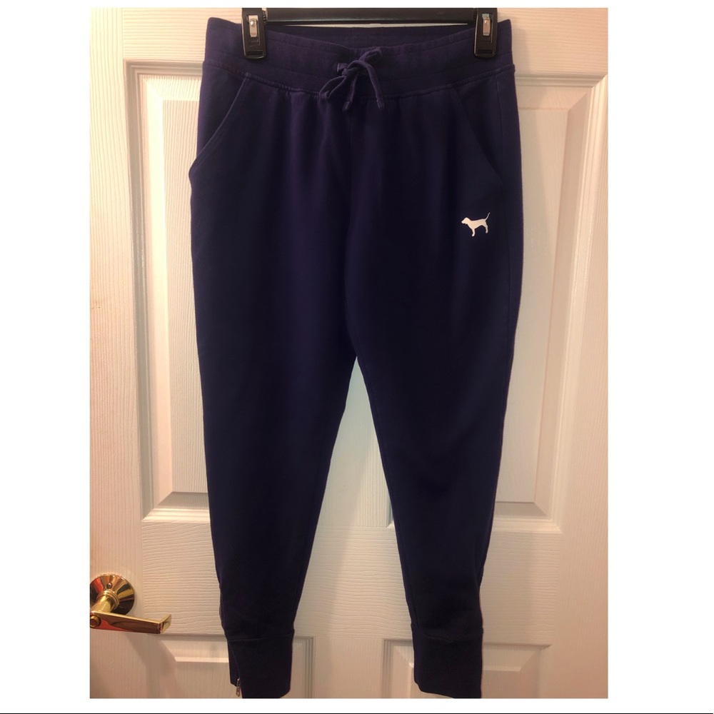 Pink Sweatpants w/ zippers on ankles of pants.